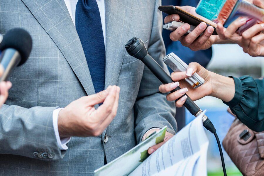 cropped-hands-journalists-interviewing-businessman-city_1048944-10994425
